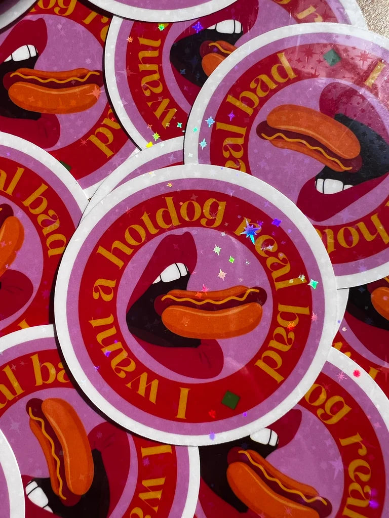 Stickers with a hotdog graphic and text on a red background