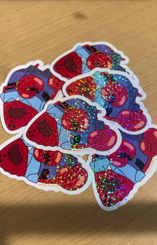 Colorful Mr. Krabs empty shell from spongebob stickers with glitter on a wooden surface