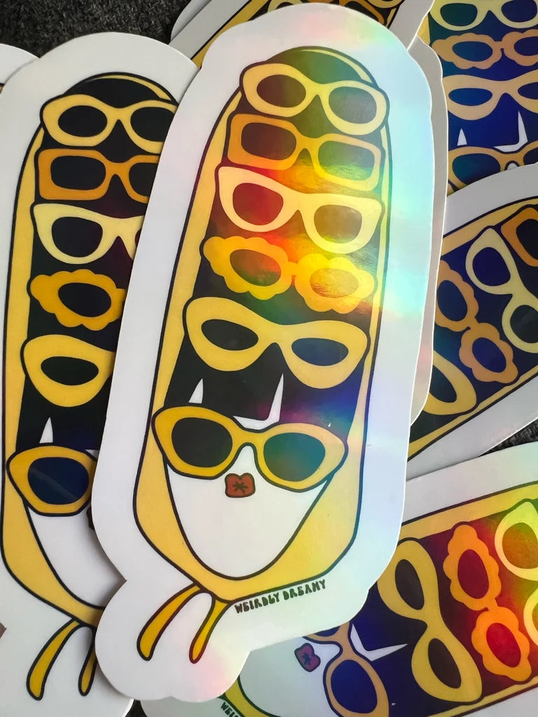 Holographic sticker of a drag queen Nymphia Wind with sunglasses on a white background