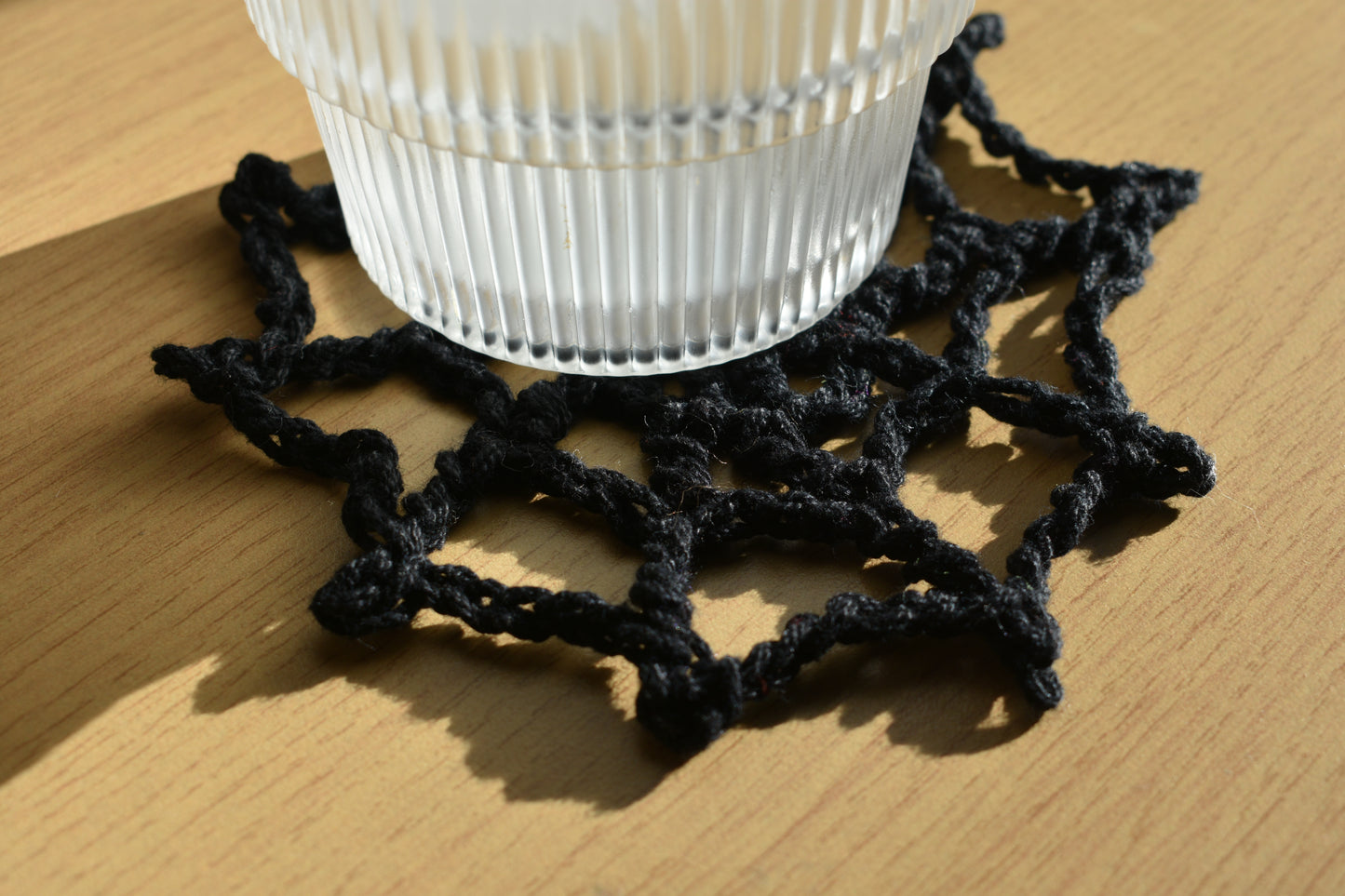 The widow's web coaster