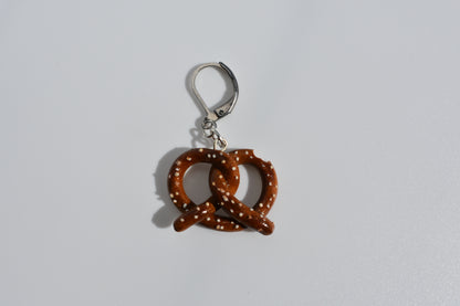 Pretzel-shaped keychain on a white background