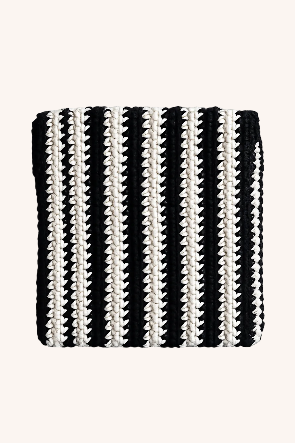 A square black and beige striped knit pouch with a textured, ribbed pattern, shown flat on a beige background.