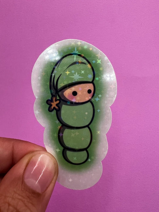 Sticker of a character in a green outfit with stars on a pink background