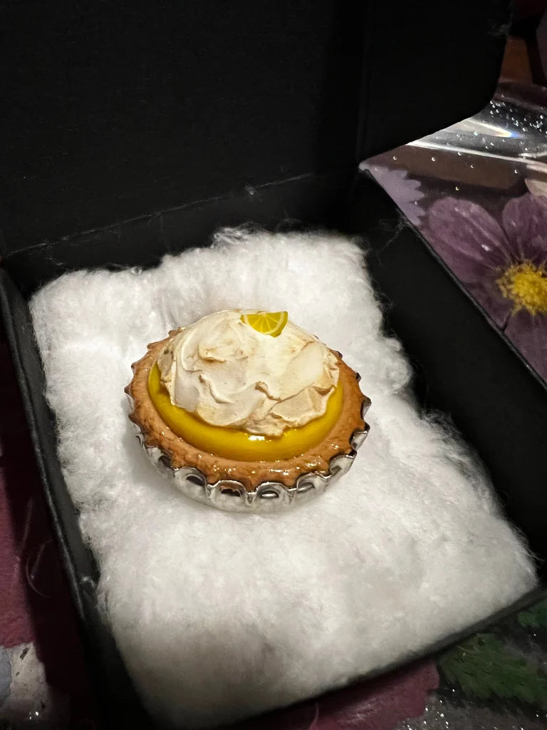 Small dessert in a box with a floral background